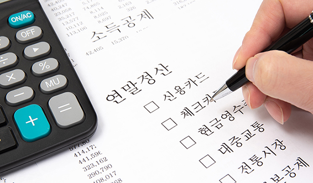 a calculator on financial chart, business concept. a calculator on financial chart, business concept.